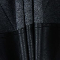 時尚與保暖的完美結合 茵曼2012冬裝皮革拼接立領連帽衛(wèi)衣外套解析